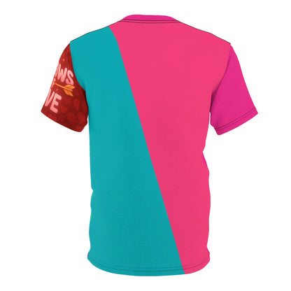 Back view of a t-shirt with diagonal turquoise and pink color blocking and red patterned sleeves.