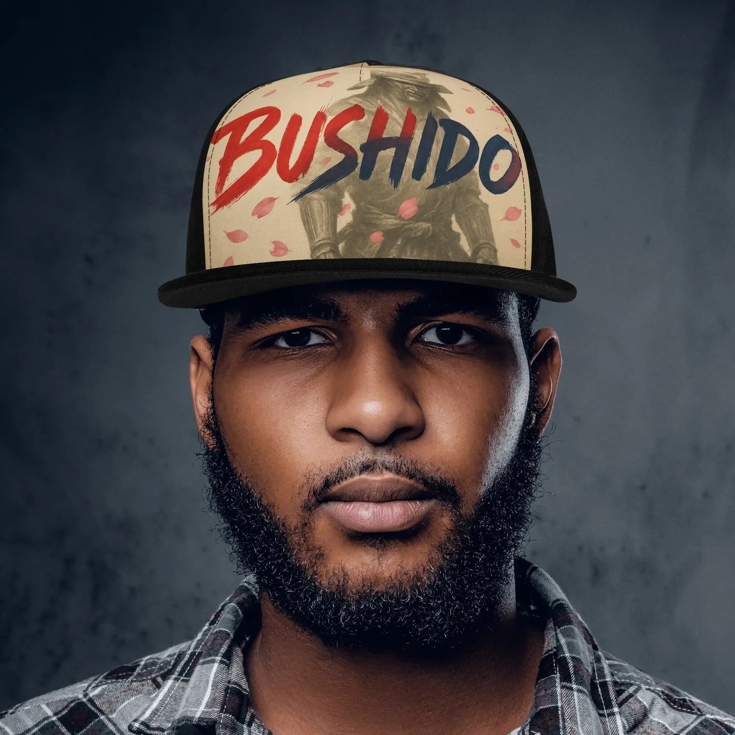 A man wearing a "Bushido" baseball cap.