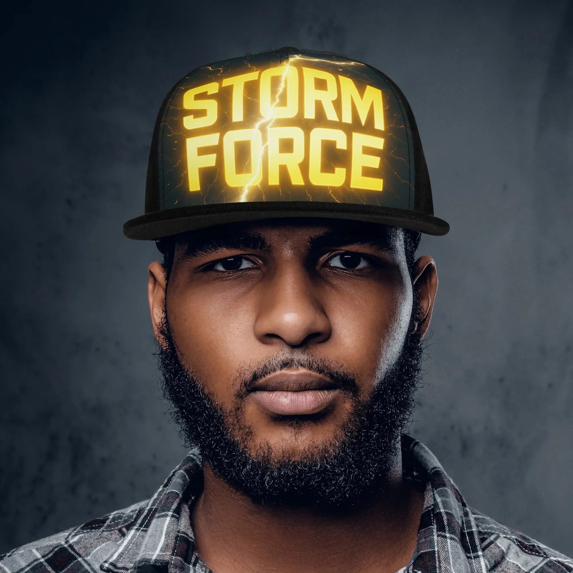 Man wearing a black "Storm Force" baseball cap.