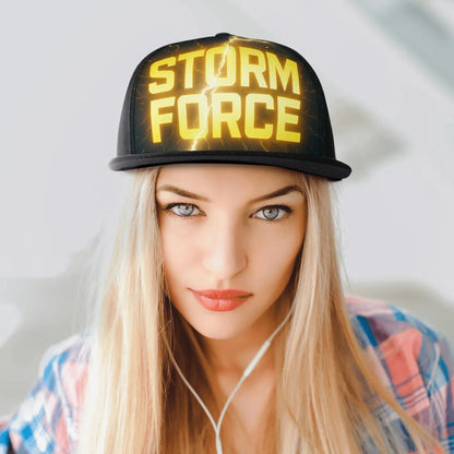 Blonde woman wearing a "Storm Force" hat and plaid shirt.